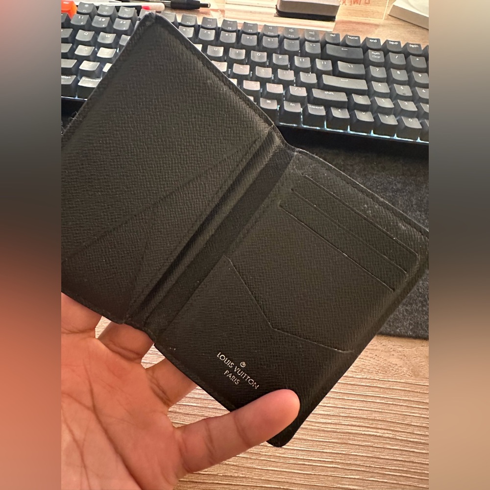 Louis Vuitton bifold Wallet slightly used.